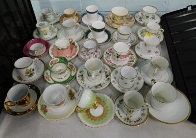 Lot 2165 - A quantity of ceramic coffee cans and saucers,...