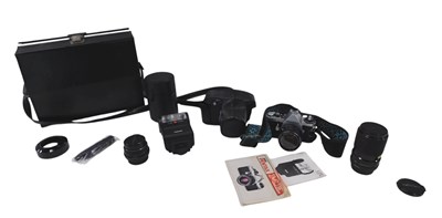 Lot 907 - A Pentax ME camera & various lenses.