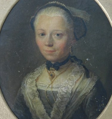 Lot 328 - 18thC School. Portrait miniature of a lady...