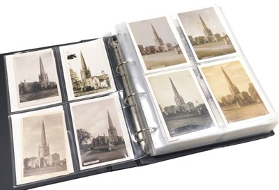 Lot 175 - An album of topographical postcards, relating...