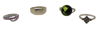Lot 178 - Four dress rings, comprising a diamond and...