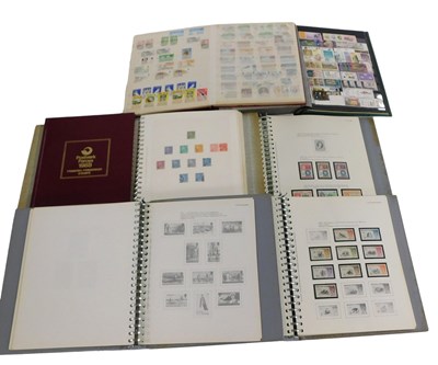 Lot 134 - Stamps.- an accumulation of stamps in 7 albums,...