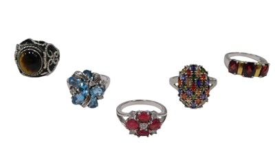 Lot 177 - Five multistone dress rings, comprising a pave...