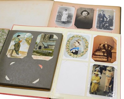 Lot 208 - An early 20thC postcard album, containing...