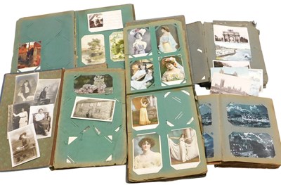 Lot 215 - Five early 20thC postcard albums, containing...