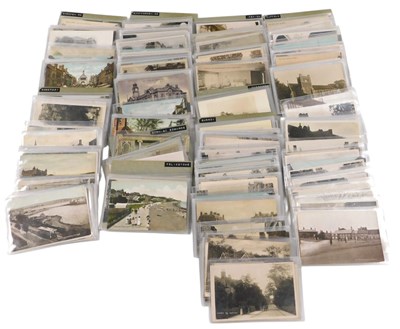 Lot 286 - A group of English topographical postcards,...
