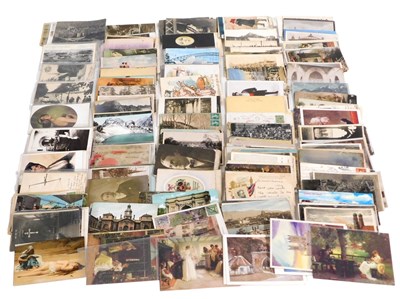 Lot 324 - A mixed accumulation of 20thC postcards,...