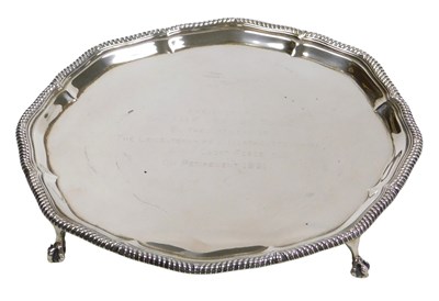Lot 107 - A George V silver pie crust salver, with a...