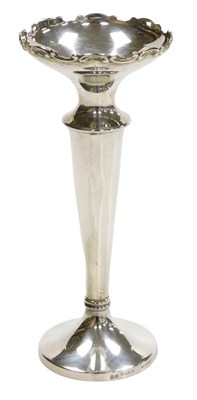 Lot 116 - A George V loaded silver bud vase, of tapering...