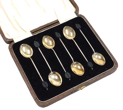 Lot 117 - A set of six George V silver coffee spoons,...