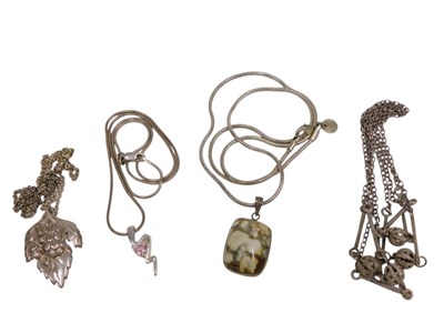 Lot 166 - Four pendants and chains, comprising a leaf...