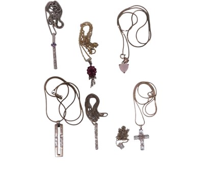 Lot 167 - Seven silver pendants and chains, comprising...