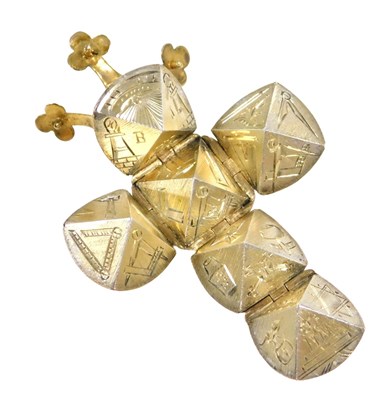 Lot 204 - A Masonic folding ball pendant, rose metal,...