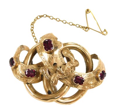 Lot 206 - A Victorian garnet set brooch, in a double...
