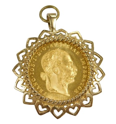 Lot 8 - An Austrian one ducat gold coin 1915, in a 9ct...