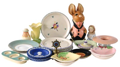 Lot 148 - Four Poole pottery dishes, traditionally...