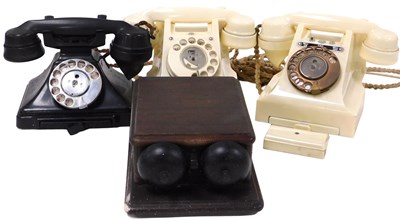 Lot 75 - A GPO black Bakelite dial telephone, with a...