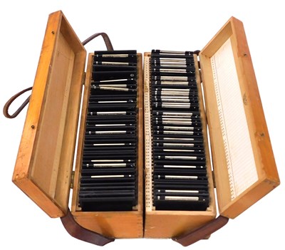 Lot 81 - Two cases of slides, relating to the first...