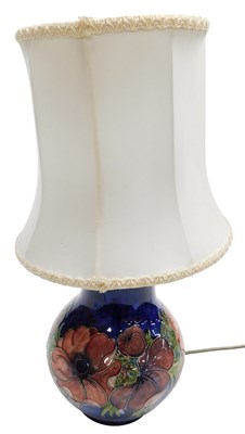 Lot 199 - A Moorcroft pottery Anemone pattern table lamp,...