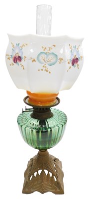 Lot 221 - An early 20thC duplex cast iron oil lamp, with...