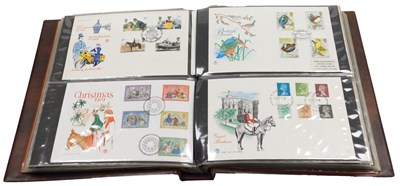 Lot 232 - Philately. An album of GB first day covers,...
