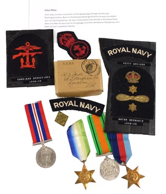 Lot 273 - Four World War II medals, awarded to John...
