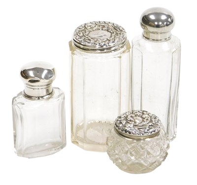 Lot 405 - A George V cut glass toilet bottle, with a...