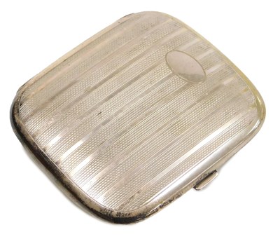 Lot 409 - A cigarette case, with engine turned...