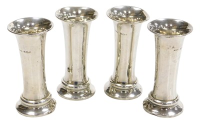 Lot 413 - Four Edward VII loaded silver bud vases, of...