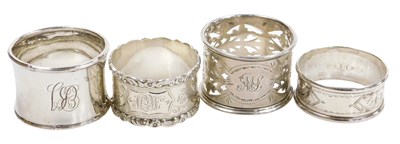 Lot 421 - Four silver napkin rings, with pierced and...