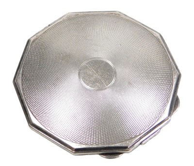 Lot 422 - A George VI silver compact, of decagonal form,...