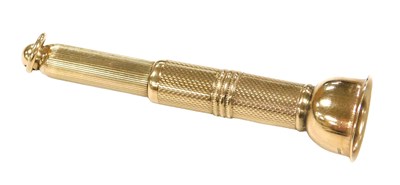 Lot 13 - A 9ct gold cigar pricker, with engine turned...