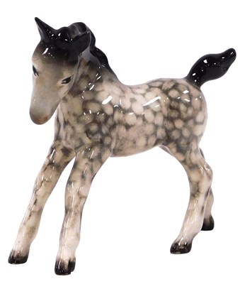Lot 17 - A Beswick pottery rocking horse grey foal,...