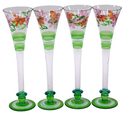 Lot 436 - A set of four continental glass champagne...