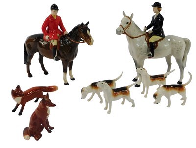 Lot 5 - A Beswick hunting group, comprising male and...