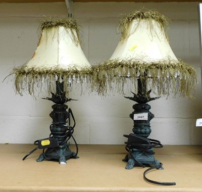 Lot 2067 - A pair of resin table lamp bases, with...
