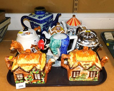 Lot 2096 - Novelty and other teapots, to include two...