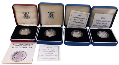 Lot 517 - Four Royal Mint United Kingdom silver proof...