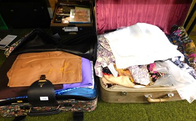 Lot 2188 - Two suitcases, containing fabric offcuts,...