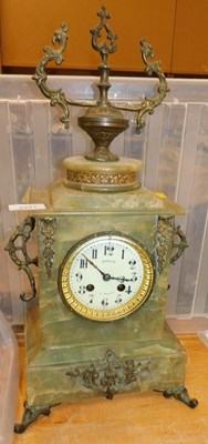 Lot 2221 - A French green onyx mantel clock, the circular...