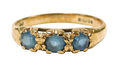 Lot 569 - Z876. A 9ct gold and topaz three stone ring,...