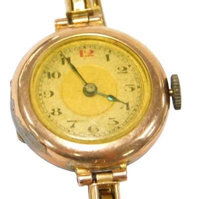 Lot 572 - A mid century lady's 9ct rose gold circular...