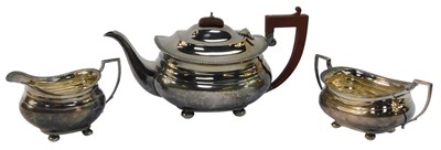 Lot 11 - A George V silver three-piece tea service, of...