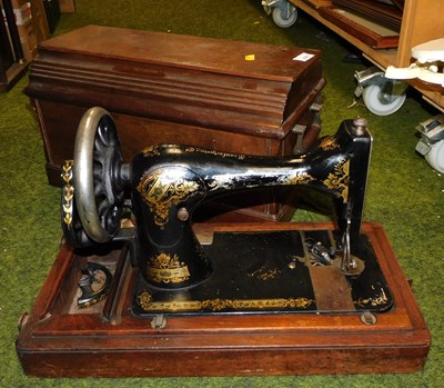 Lot 2246 - A Singer hand operated cased sewing machine.