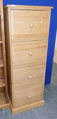 Lot 1007 - A pine four drawer filing cabinet, the top...