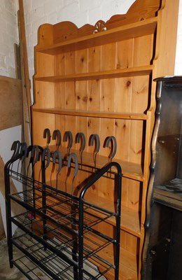 Lot 1018 - A pine waterfall open bookcase, with a pierced...