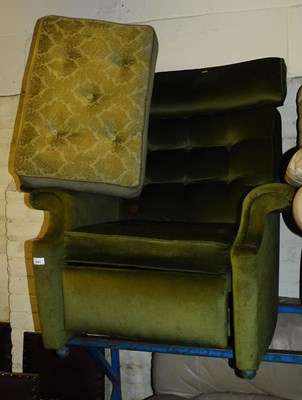Lot 1021 - A mid century armchair, upholstered in green...