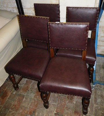 Lot 1022 - A set of four oak framed dining chairs, each...