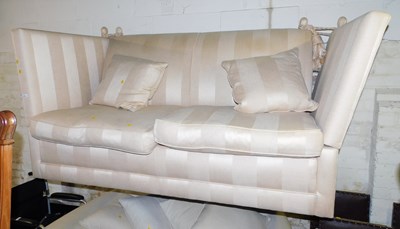 Lot 1024 - A late 20thC drop arm sofa, upholstered in...