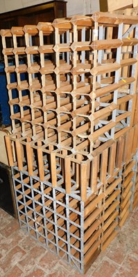 Lot 1031 - Five wine bottle racks.